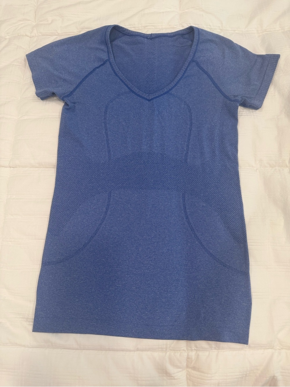 Lululemon athletic t-shirt, sky blue, lots of stretch and very soft fabric.